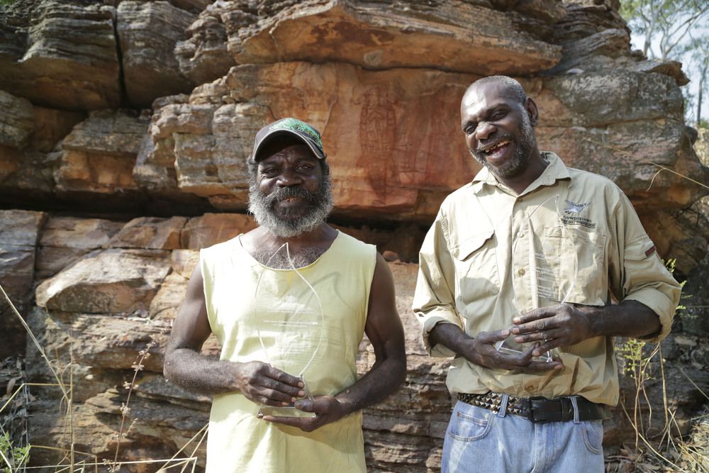 Jeffrey Lee and Stewart Gangale with the Ochre Green Environmental awards at the Blue Tongue dreaming site, Koongarra Saddle. PHOTO: DOMINIC O’BRIEN