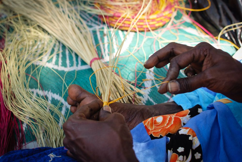 Marlene Badwana from Jabiru Town Camp shows how pandanus weaving is done at one of the cultural demonstrations organised by Children's Ground.
