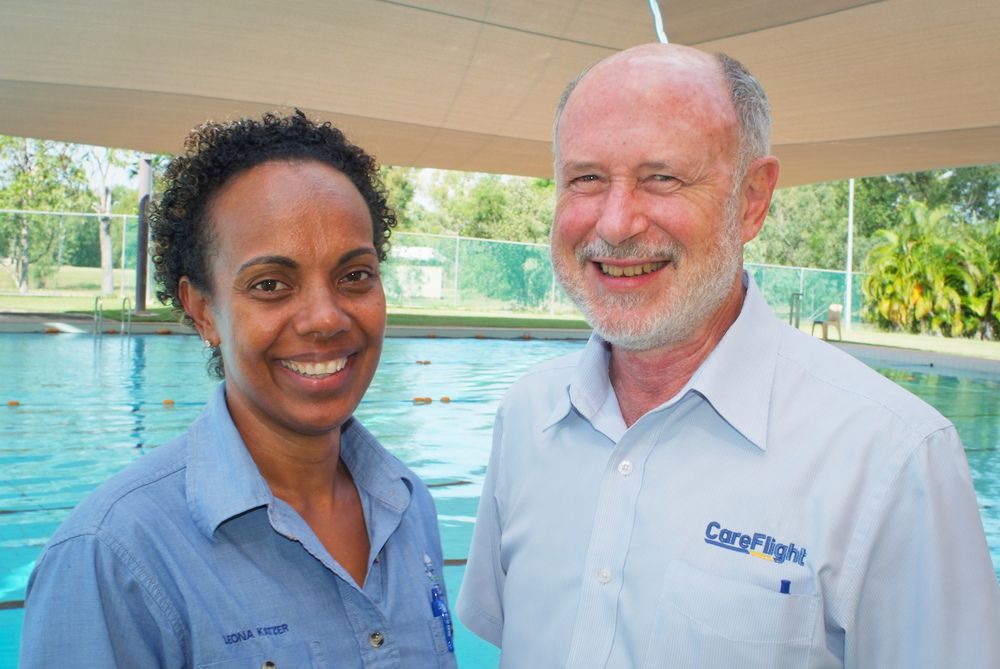 Kakadu Triathlon event coordinator Leona Katzer with CareFlight founding director Ian Badham at the Jabiru town pool last week.